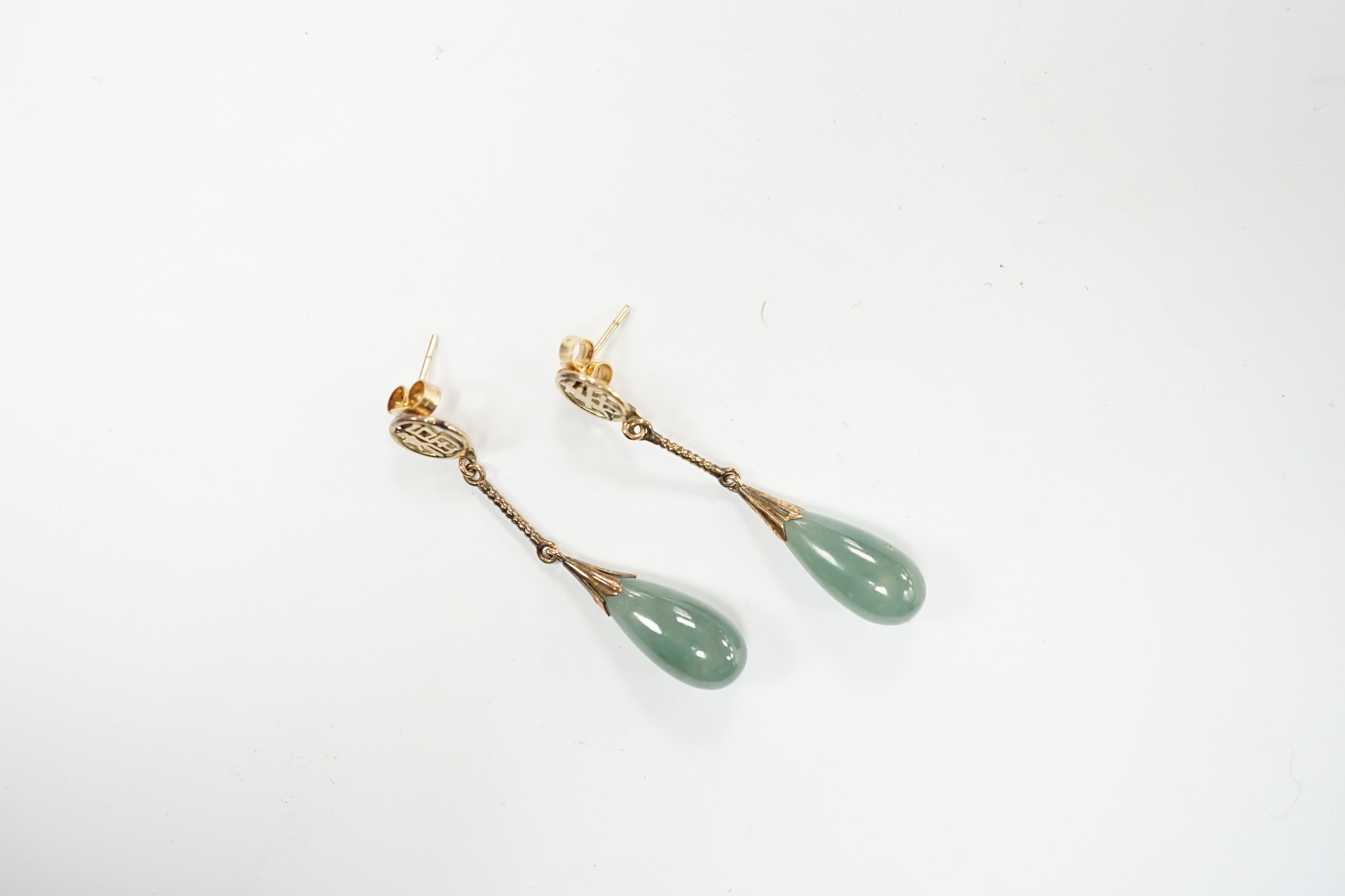 A pair of Chinese yellow metal and jade set drop earrings, 45mm, gross weight 5.7 grams.